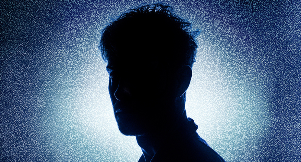 A person shown in silhouette