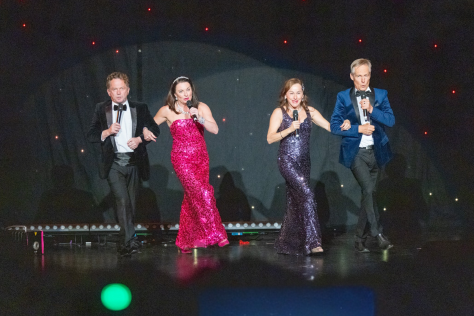 Pot-Pourri Group performing on stage.