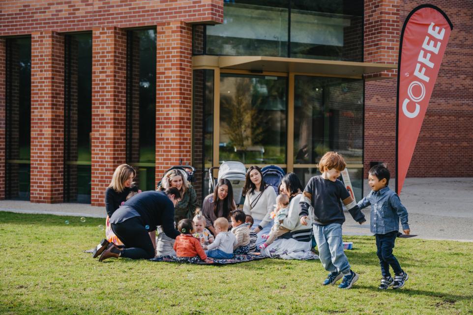 children playing outside the round